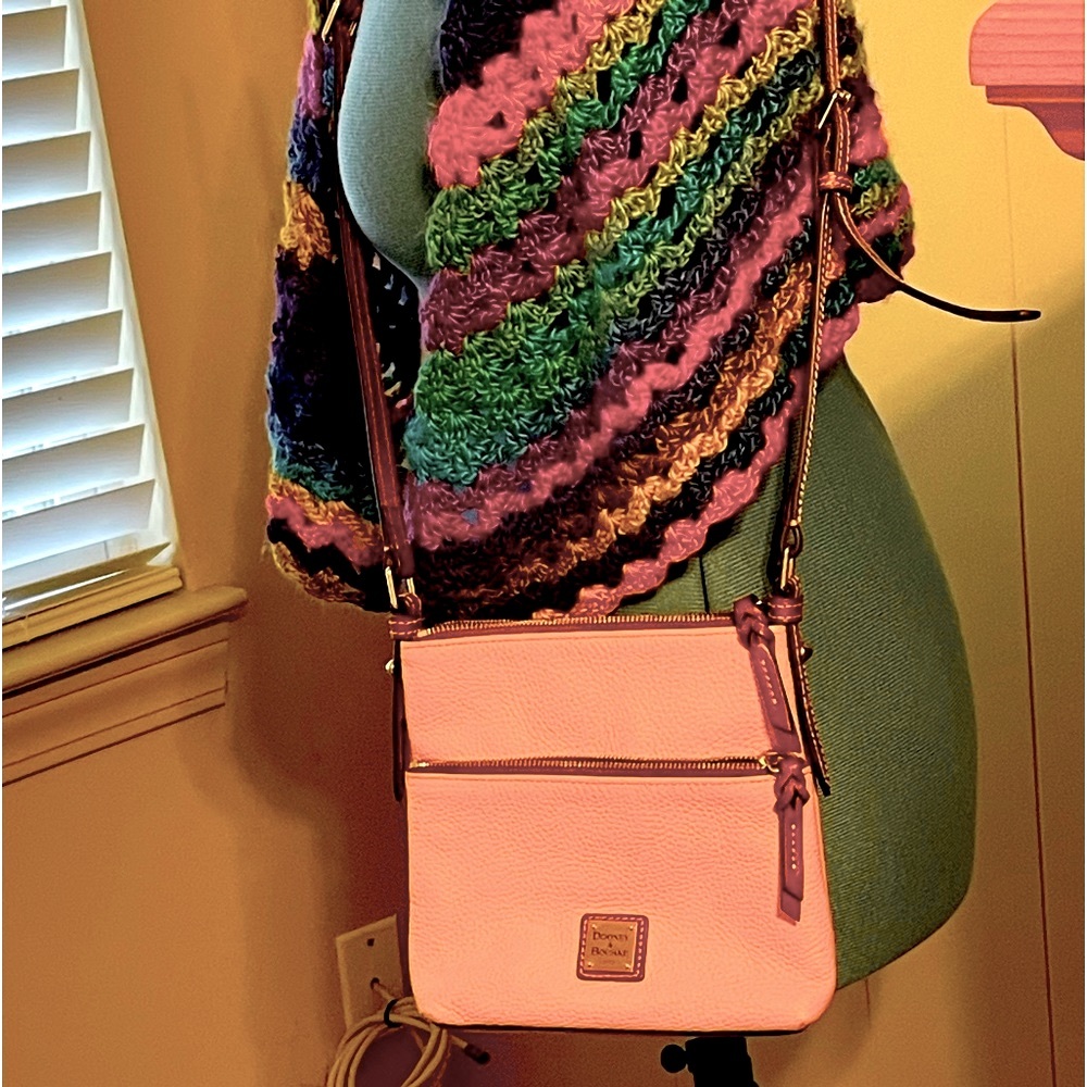 Dooney pink crossbody handbag.